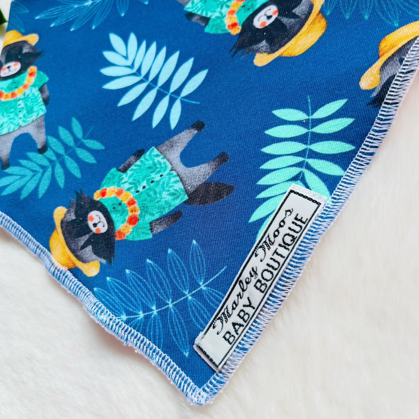 The Blue Hawaiian Raccoon Baby & Toddler Bib
