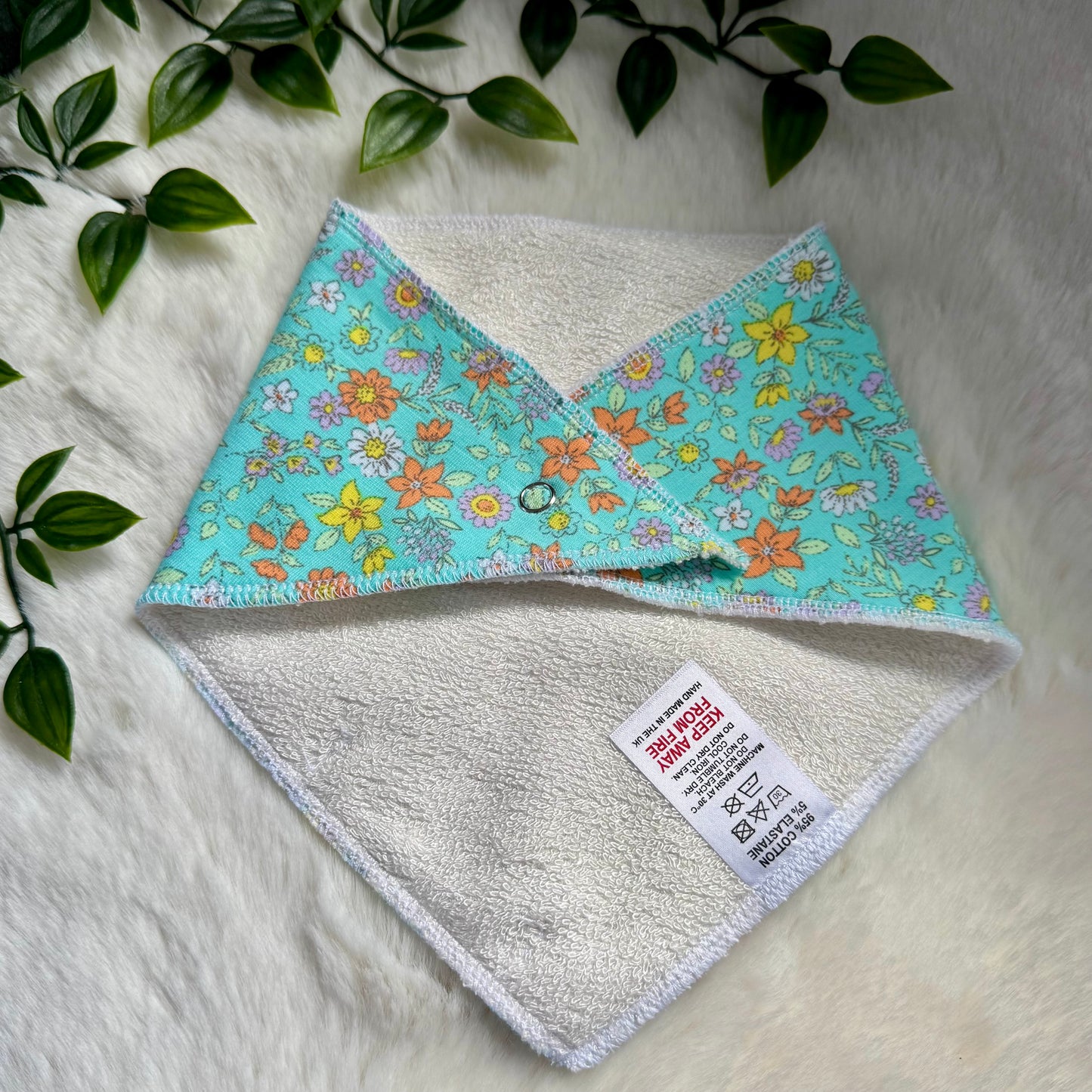 The Turquoise Ditsy Floral Baby Bib
