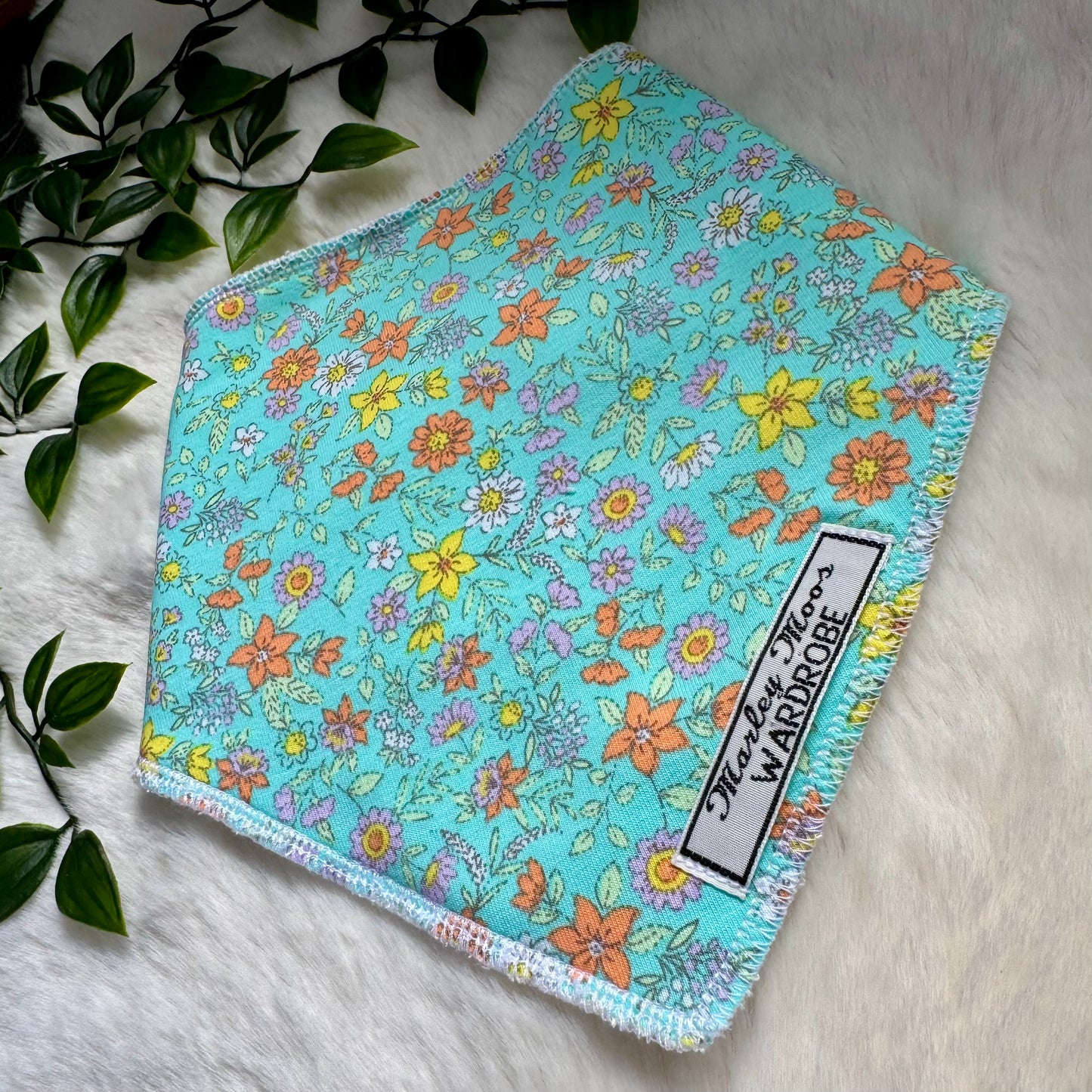 The Turquoise Ditsy Floral Baby Bib